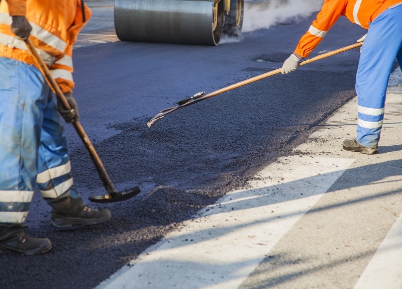 Repairing the road - HMA Contracting Featured Image for 4 Truths Business Owner’s should Know about Asphalt Pavement