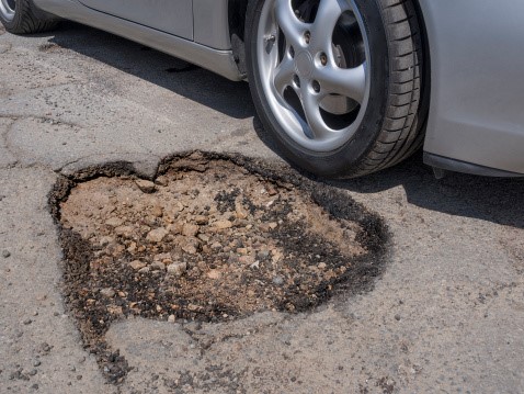 Featured Image for Potholes Can Damage Vehicles