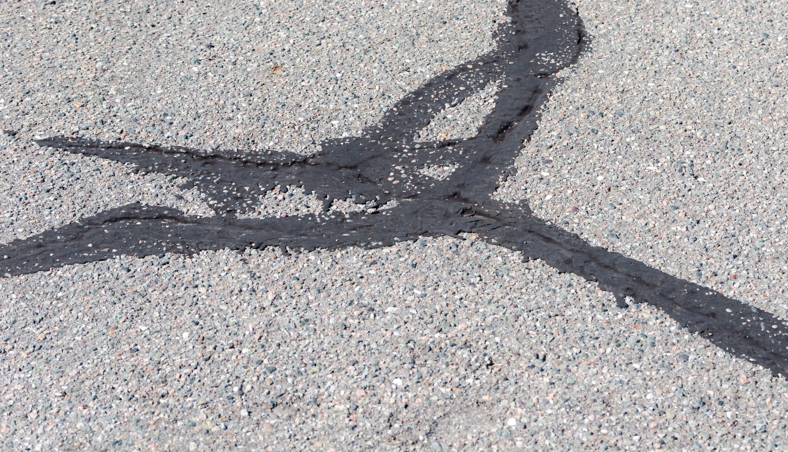 Cracked Driveway Sealed - HMA Contracting driveway crack sealed
