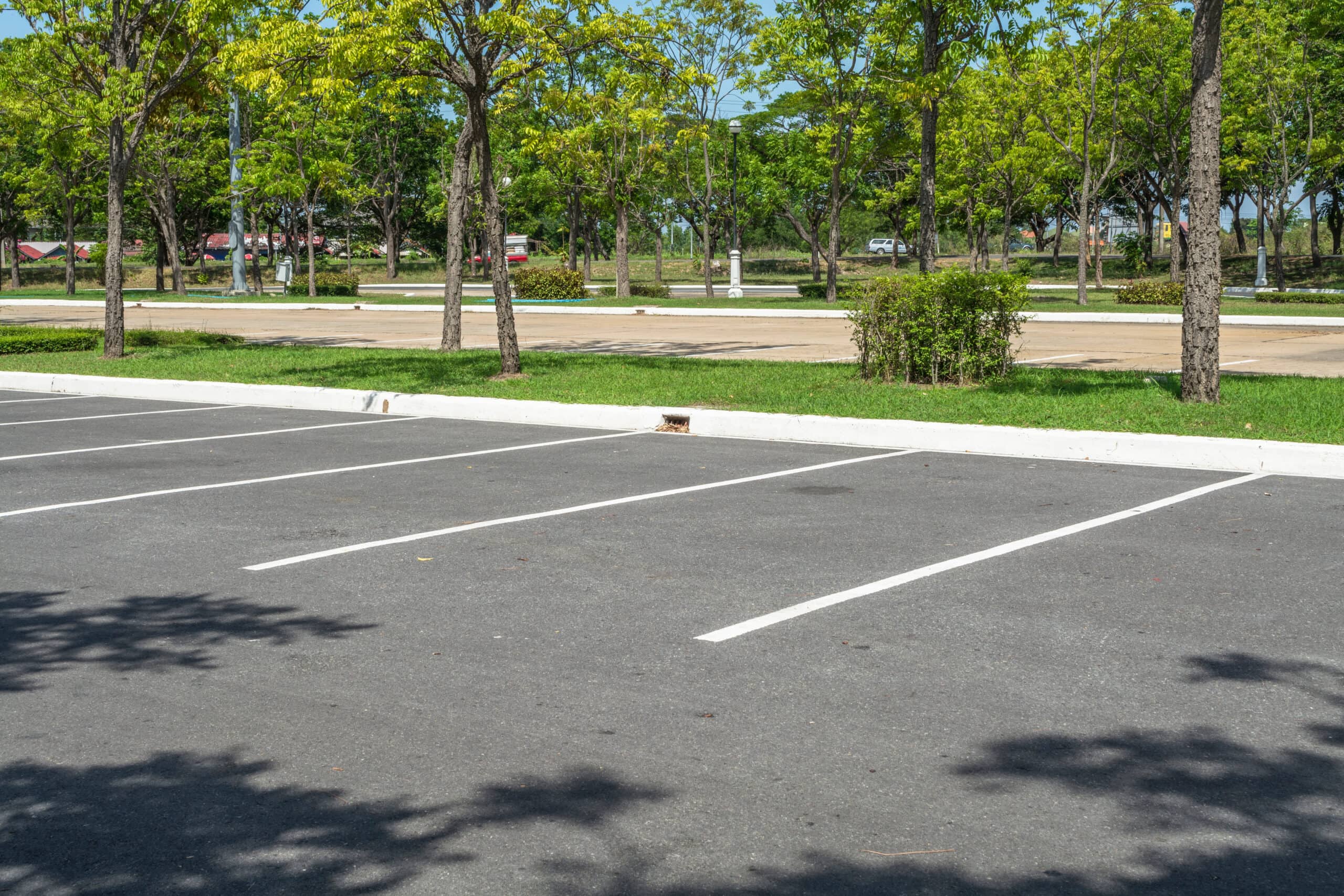 Photo of parking lot with empty spaces